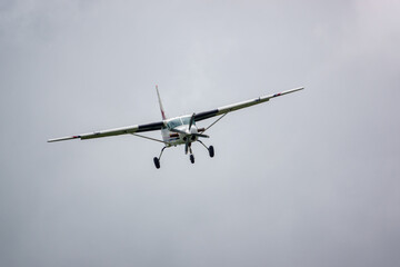 light aircraft returning to land after dropping the parachute display team on a practice jump 