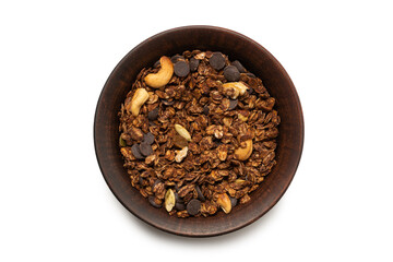 Chocolate granola cereal with nuts in a bowl background.