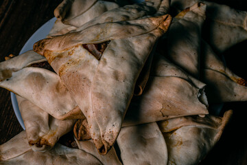 arabic fatay pie on wooden base