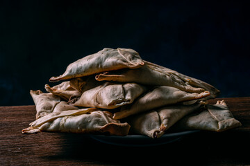 arabic fatay pie on wooden base