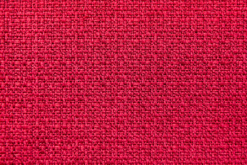 Background image - textured natural rough fabric of burgundy color