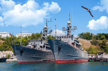 Warship military navy battle ship near the pier