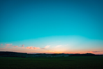 Fototapeta na wymiar Sunset and dark blue sky.