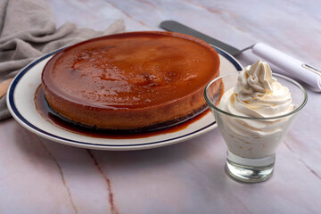inverted cake chocoflan flan with chocolate sponge cake with cream delicious sweet dessert on counter
