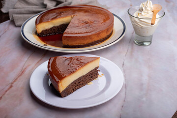 inverted cake chocoflan flan with chocolate sponge cake with cream delicious sweet dessert on counter