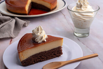inverted cake chocoflan flan with chocolate sponge cake with cream delicious sweet dessert on counter