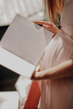 Pregnant Woman Read With White Book Mockup In Hand On Shine Background