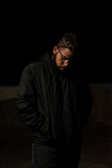 Fototapeta premium Lowkey photoshoot of a dominican men with african braids