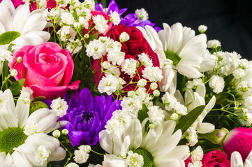 Background for a greeting card - beautiful gift bouquet of various colorful decorative summer flowers