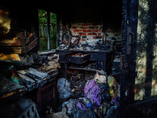 Burnt old house interior. Consequences of fire