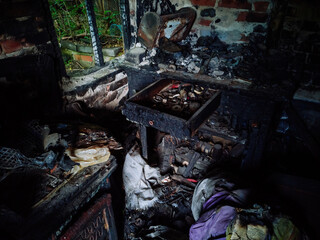 Burnt old house interior. Consequences of fire