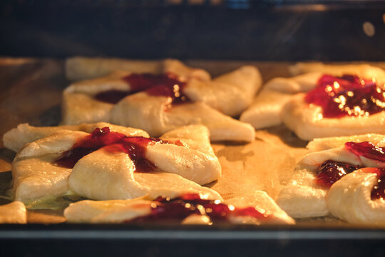 Plum puff pastry from Finland joulutorttu in the oven