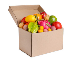 Cardboard box with different exotic fruits on white background