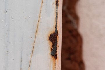 Close up Rusty white painted metal border