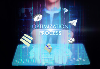 Business, Technology, Internet and network concept. Young businessman working on a virtual screen of the future and sees the inscription: Optimization process