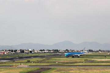 Fototapeta premium Airplane settling on runway to take off or land 