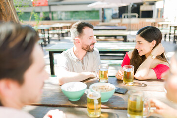 Flirty latin woman having a conversation with her crush