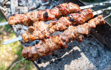 Grilling barbecue close-up, coals, smoke.