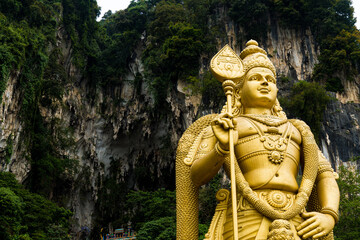 Big Hindu God statue of Murugan at Batu Caves - Hindu Temple, Kuala Lumpur, Malaysia
