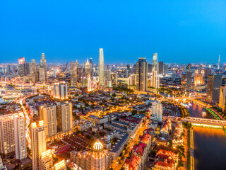Naklejka na ściany i meble Aerial photography of Tianjin city building skyline night view
