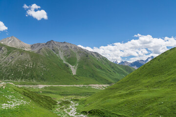 Obraz premium Mountains and grasslands along G217 highway in Xinjiang, China in summer