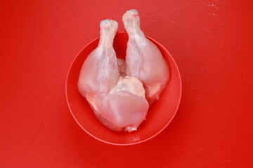 Raw whole chicken leg