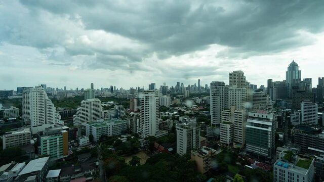 Still, 4K time lapse of rain storm cloud coming to Bangkok business district area
