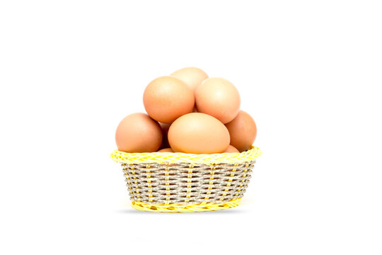 Fresh and organic Egg in basket isolated