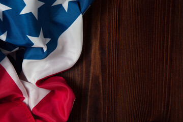 Closeup of American flag on wooden background