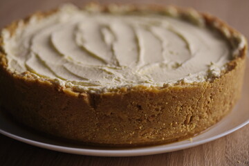 Large banana homemade cream pie on a plate