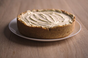 Large banana homemade cream pie on a plate