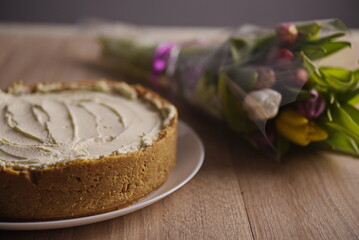 Banana homemade cream pie and a bouquet of flowers