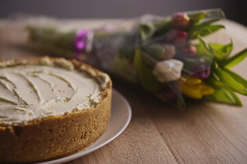 Banana homemade cream pie and a bouquet of flowers