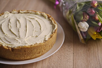 Banana homemade cream pie and a bouquet of flowers