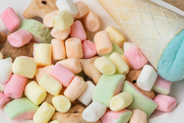 Junk food desserts in white plates.