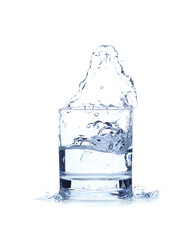 Glass of water with splash on white background