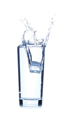 Glass of water with splash on white background
