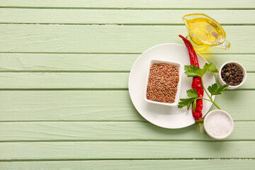 Composition with flax seeds, oil and spices on color wooden background