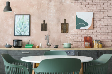 Interior of stylish modern kitchen with dining table