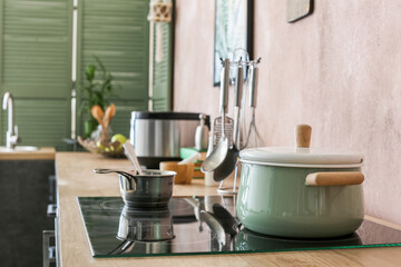 Cooking pot on stove in kitchen