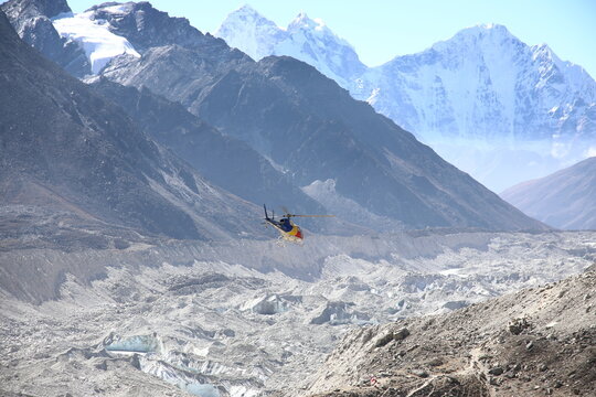 Helicopter and Khumbu Glacier near Gorak shep, Nepal