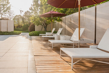 lounge chairs and umbrellas