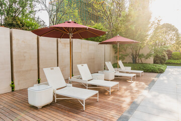 lounge chairs and umbrellas