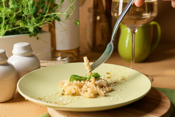 Plate of tasty pasta on color background, closeup