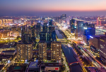 Aerial photography of the night view of the urban architecture skyline of Ningbo, Zhejiang