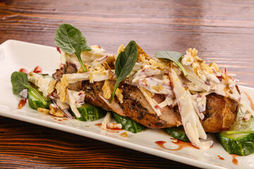 Baked pork with vegetables and sauce