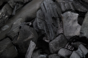 Grill charcoal texture. Bbq coal block isolated. Activated barbeque charcoal, natural organic hard wooden fuel, black mineral top view. Pure wood ignition