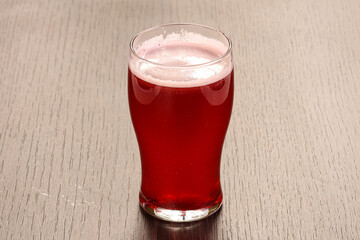 Strawberry homemade lemonade in the glass