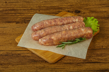 Raw pork meat sausages for grill