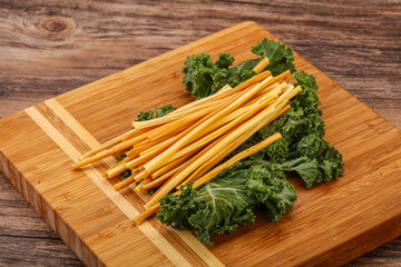 Chechel cheese sticks over board